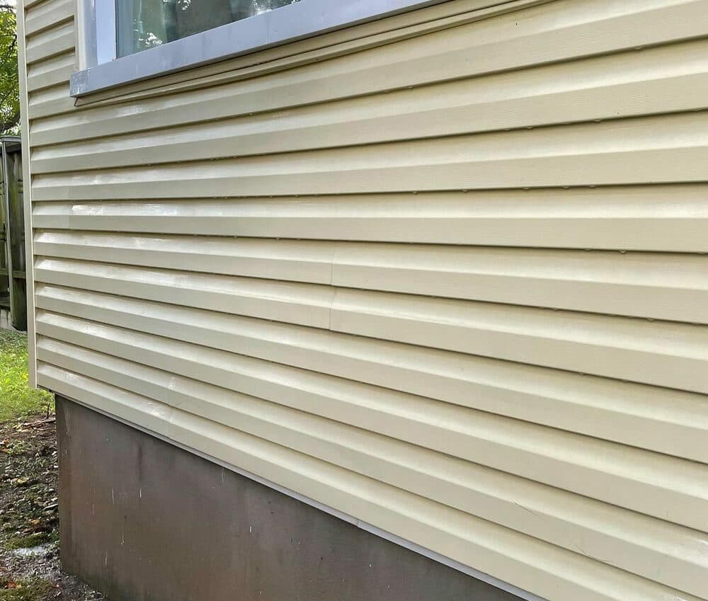After — Exterior cleaning siding before and after in Grimsby