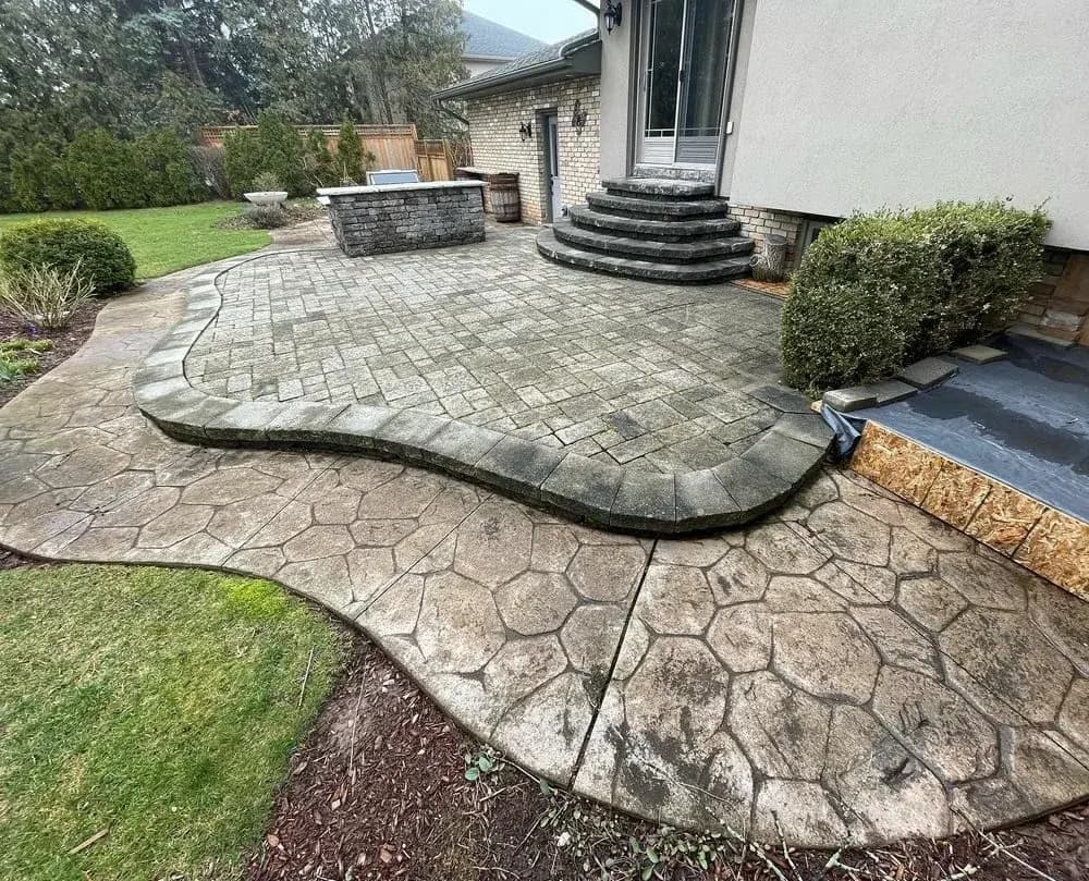 Before — Patio pressure washing before and after in Grimsby